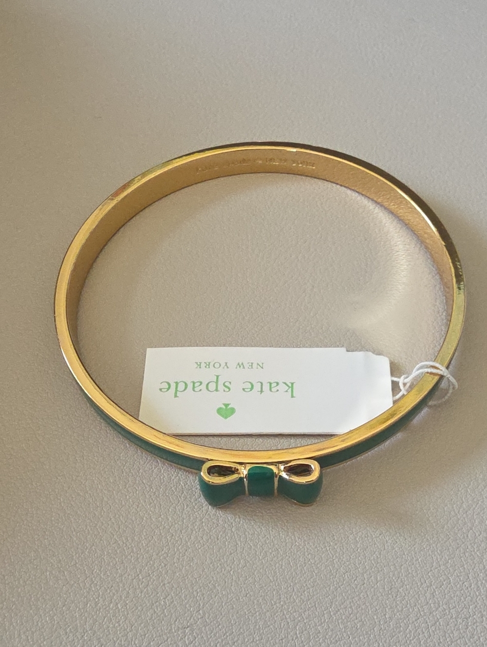 kate spade Gold Plated Bangle with Emerald Enamel Bow